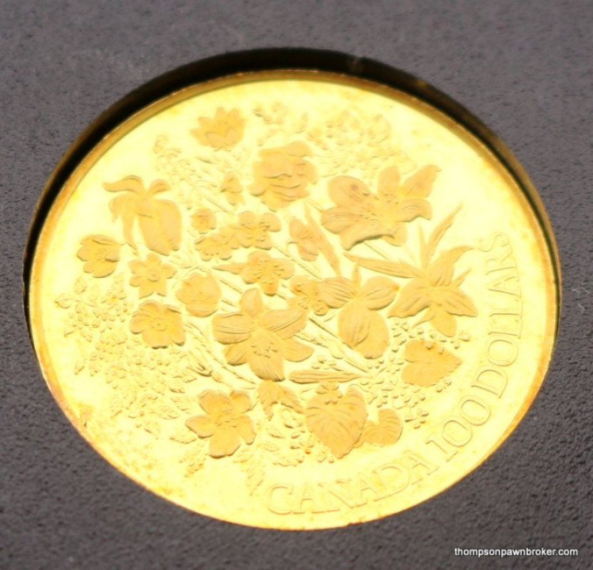 Royal Canadian Mint for the Queen’s Silver Jubilee $100.00 Gold Coin/Case